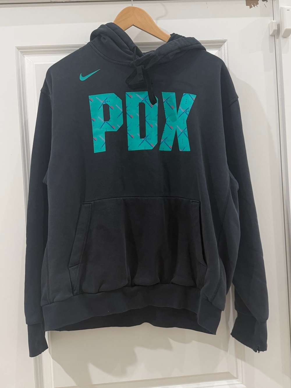 Good condition Nike Black Pullover Hoodie with Teal Carpet PDX Logo | L